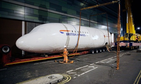 An aeroplane being installed at the London KidZania