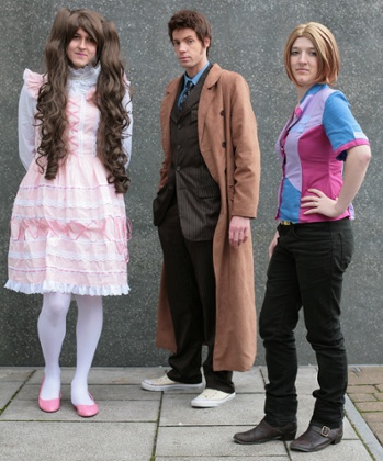 Rik Booker, Roxas Strife and TJ Bailey dressed as Gothic Lolita, Doctor Who and Rose Tyler respectively at Comic-Con in London.