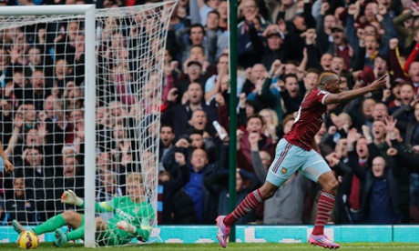 Diafra Sakho wheels away in celebration after scoring West Ham’s second goal against Manchester City in the Premier League at Upton Park.