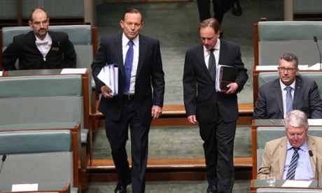 The Prime Minister Tony Abbott and the environment minister Greg Hunt arrive for question time.