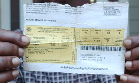 Eric Lyndell Kennie with his voter registration certificate, which Texas now considers insufficient to vote.