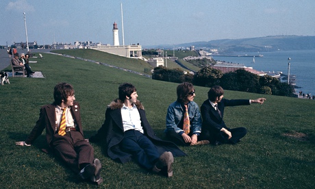 Photograph by David Redfern of The Beatles in 1967 on a clifftop in Plymouth Hoe