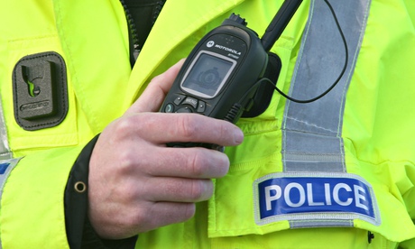 Man in police jacket