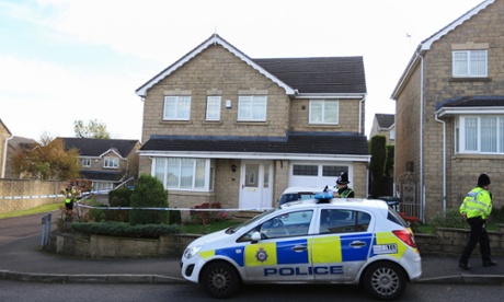 Police attend the scene in the Clayton area of Bradford, after four people were found dead.