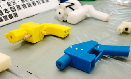 3D printed handguns are displayed at Kanagawa police station in Yokohama, south of Tokyo on May 8, 2014.