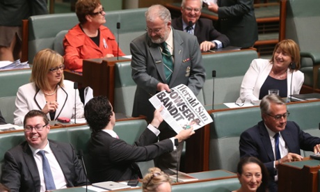 Tim Watts hands over his visual 