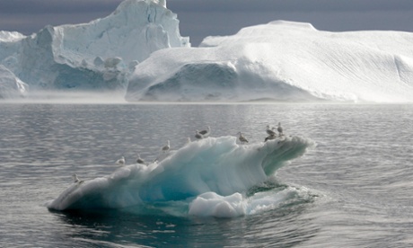 A fjord behind the town of Ilulissat in Greenland. Melting land ice accounts for about half the current rate of sea level rise, according to the latest research. Photograph: Reuters.