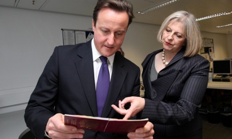 David Cameron and home secretary Theresa May visiting UK Border Agency staff at Heathrow Airport in 2010