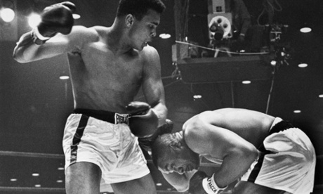 Muhammad Ali triumphs over Sonny Liston in their world title bout, Miami Beach, Florida, 1964