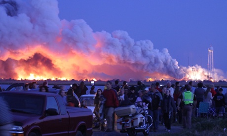 People who came to watch the launch walk away after the explosion in Virginia.
