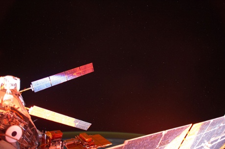 Photographed with a mounted automated camera, this is one of a number of images featuring the European Space Agency's Automated Transfer Vehicle (ATV-5 or Georges Lema  tre) docked with the International Space Station. Except for color changes, the images are almost identical. The variation in color from frame to frame is due to the camera's response to the motion of the orbital outpost, relative to the illumination from the sun.