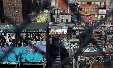 Graffiti'd buildings under Manhattan Bridge, New York.