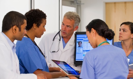 Doctors and nurses at computer