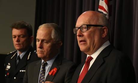 George Brandis and communications minister Malcolm Turnbull speak to the media in Canberra on Thursday.