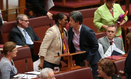 Senator Nova Peris is greeted by Penny Wong.