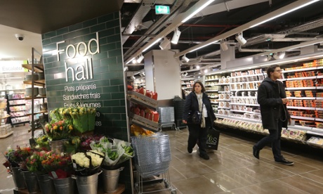 Customers shop in a Marks & Spencer store in France