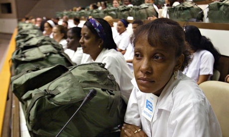 Doctors with backpacks loaded with medication in Havana, Cuba
