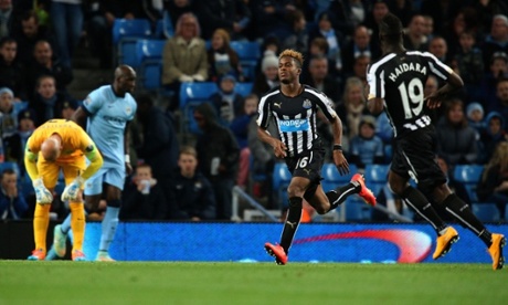 Newcastle United goalscorer Rolando Aarons runs towards the bench after scoring the opening goal.