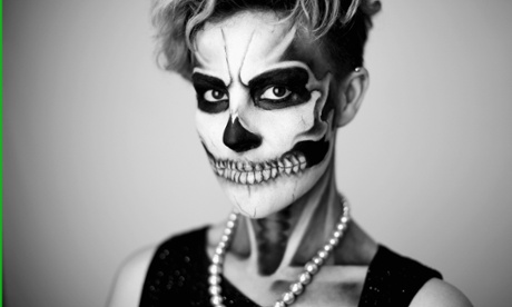 A woman in full zombie war paint