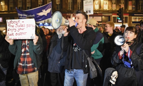 Demonstrators outside at event in Glasgow attended by Labour party leader Ed Miliband