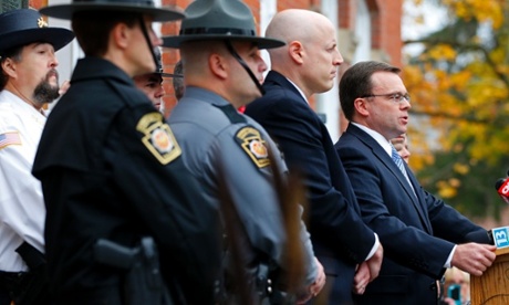 Pike County district attorney Ray Tonkin, right, talks about the arraignment of Eric Frein.