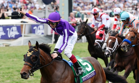 Frankie Dettori celebrates aboard Hootenanny after winning the Juvenile Turf.