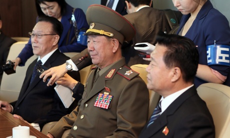 Kim Yang-gon, left, Hwang Pyong-so and Choe Ryong-hae at the meeting with South Korea's unification minister, Ryoo Kihl-jae  in Incheon.