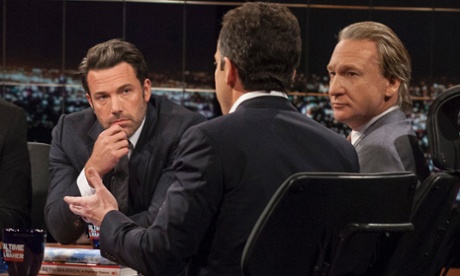 Bill Maher and Ben Affleck look on as Sam Harris, author of Waking Up: A Guide to Spirituality Without Religion, speaks during Real Time With Bill Maher.