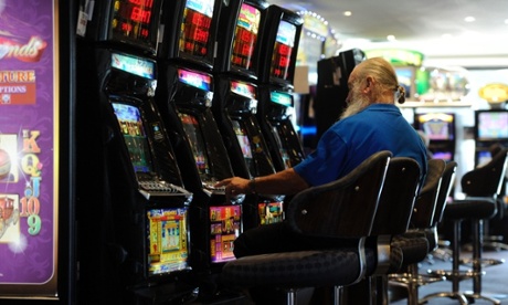 Man playing pokies 