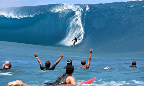 Takanui Smith rides a wave