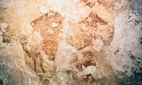 A hand stencil found in a cave in Sulawesi, Indonesia