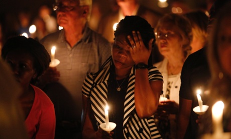 Mamie Mangoe, a friend of the Duncan family, wipes a tear away during a memorial service for Ebola victim Thomas Eric Duncan.