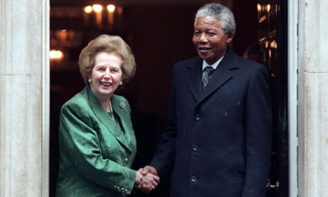 African National Congress leader Nelson Mandela (R) is greeted by British Prime Minister Margarat Thatcher at 10 Downing Street