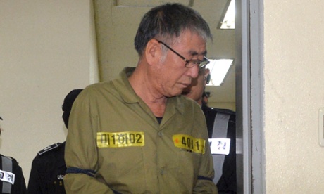 Lee Joon-seok, the captain of the Sewol, arrives to hear the verdict.