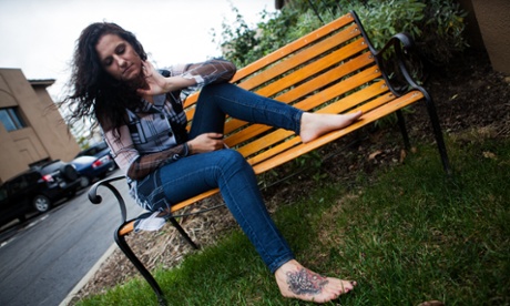 Christina with her new tattoo obscuring the mark of the husband who trafficked her