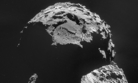 The comet as seen by the Rosetta spacecraft on 6 November. The landing site chosen for its lander, Philae, can be seen close to the top of the image above a large boulder-filled depression.