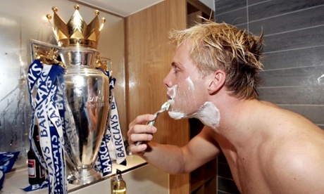 Football - Chelsea v Charlton Athletic FA Barclays Premiership  - Stamford Bridge - 7/5/05Chelsea's Eidur Gudjohnsen has a shave using the Premiership Trophy as a mirrorMandatory Credit: Action Images / Darren WalshLivepic2005Soccer