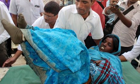 A woman is taken to hospital