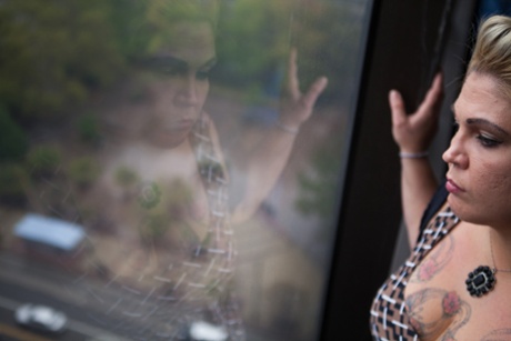 Melanie, 34, a human trafficking survivor in Columbus, Ohio, poses in the hallways of CATCH court, a programme she attends every Thursday. CATCH (Changing Actions to Change Habits) is an innovative, voluntary, two-year program designed to rescue and restore those trapped in the sex trade through intensive probation and rehabilitation services.