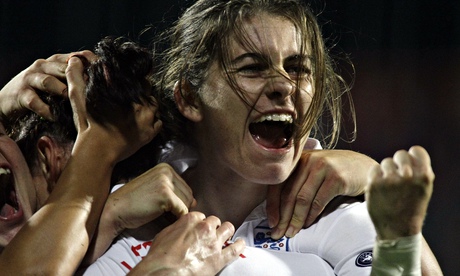 England's Carney celebrates after team-mate Scott scored a goal in Tampere