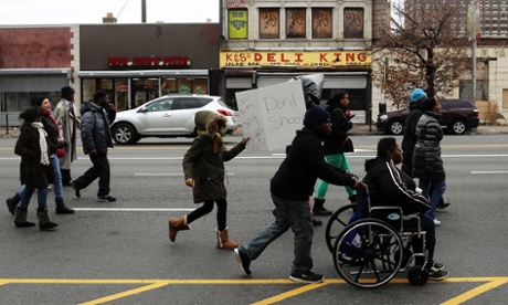 Dozens of residents, activists and community leaders participate in a march and rally against violence on 30 December 2013 in Newark. Newark had witnessed a surge in murders, car jacking and other criminal acts in the preceding months.