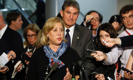 Mary Landrieu and Joe Manchin discuss the vote with reporters in Washington.