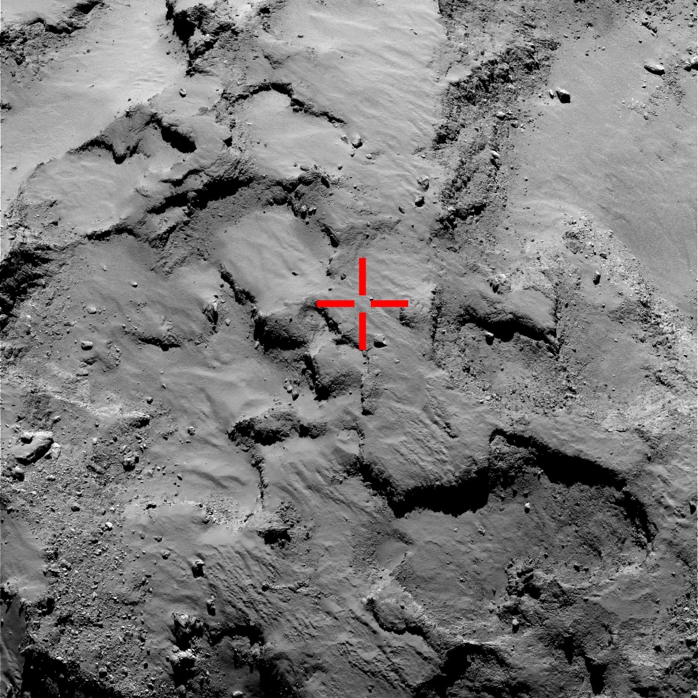 The red cross-hairs mark where Philae first hit the ground before bouncing. This image was taken by the OSIRIS instrument on Rosetta from a distance of 30 kilometres back in September. It is thought that Philae bounced twice before settling on the surface.