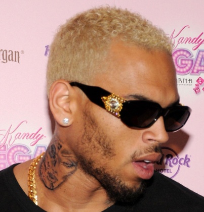Chris Brown sporting his Rihanna tattoo in 2012.
