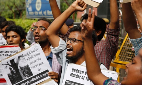 Men and women from Jawaharlal Nehru University shout during an anti-rape protest