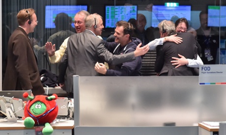 Rosetta: staff cheer in the main Esa control room in Darmstadt, Germany, after the signal from Philae arrives.