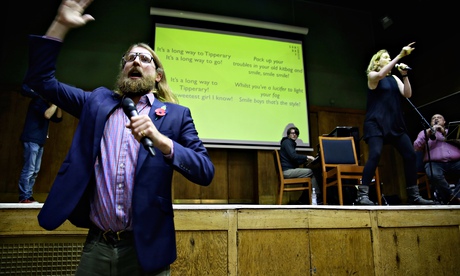 Sanderson Jones and Pippa Evans lead the singing at a non-religious Remembrance Sunday Assembly at Conway Hall, London. Photograph: Souvid Datta