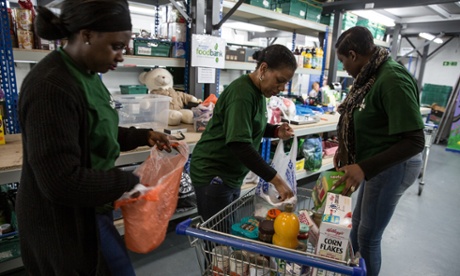 Volunteers prepare parcels at the Trussell Trust's central food bank in Birmingham.