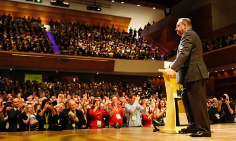 Alex Salmond leaves the stage after addressing the SNP conference for the last time as first minster