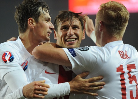 Poland's players celebrate another goal, and another win.